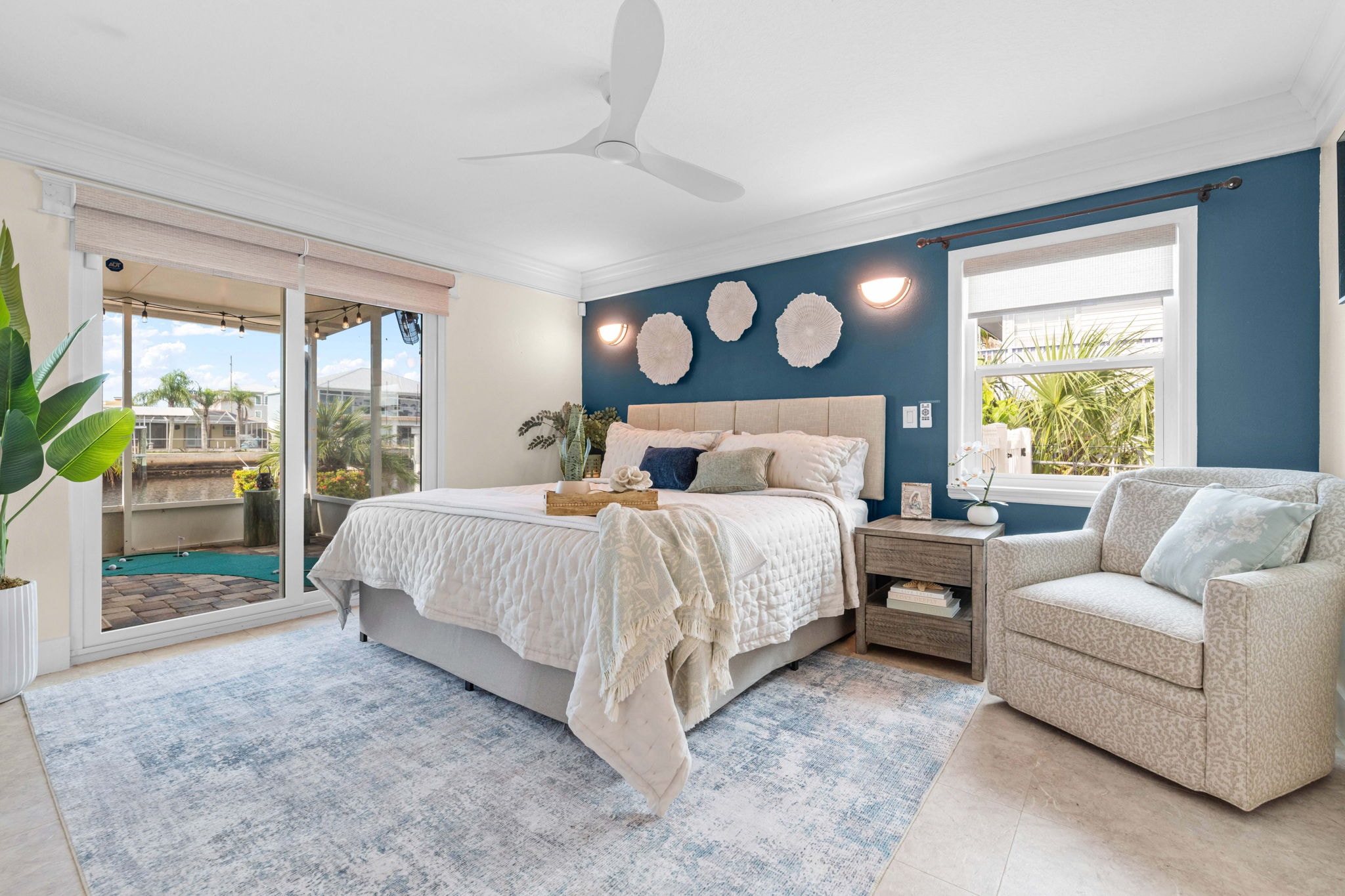 Modern bedroom with blue accent wall